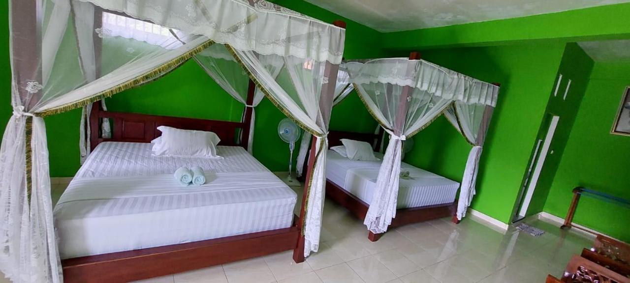 Ida Guest House & Jungle Trekking Bukit Lawang Bagian luar foto