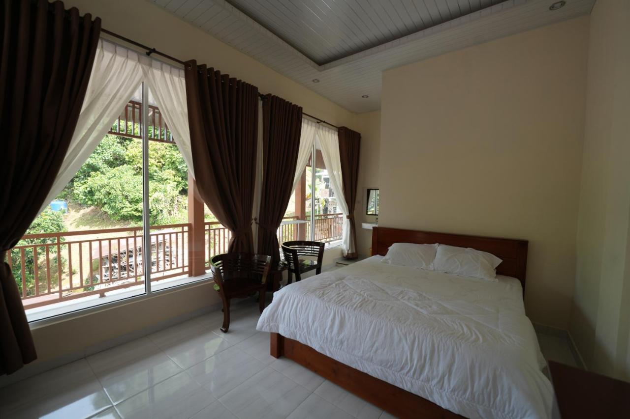 Ida Guest House & Jungle Trekking Bukit Lawang Bagian luar foto